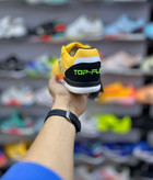 طراحی حرفهای کفش فوتسال جوما Top Flex Rebound زرد زیره نارنجی اورجینال