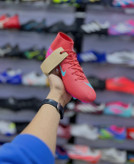 نمای جانبی کفش فوتبال Nike Mercurial Superfly 10 قرمز استوک درشت FG